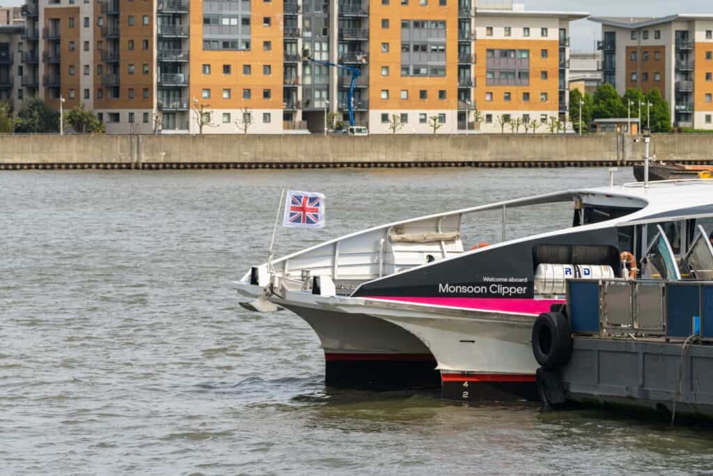 An Uber Boat docked at Woolwich Ferry Terminal in the concept of 'how to use Woolwich's public transport'.